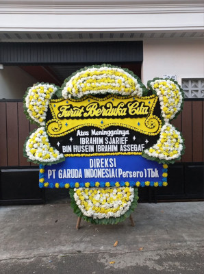 Papan Bunga Duka di Kampung Bali